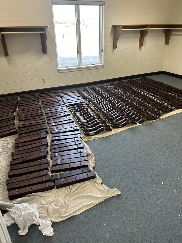 Restored pews and painted pew ends in a traditional sanctuary, Sugar Creek, OH
