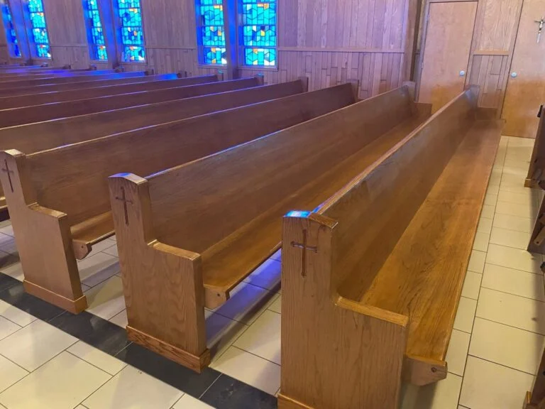 Pew wood refinished after tape marks were removed, St. Barbara’s Catholic Church, Powell, WY