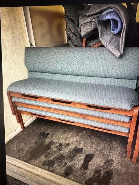 Synagogue pew benches before reupholstery, worn blue fabric, New Jersey